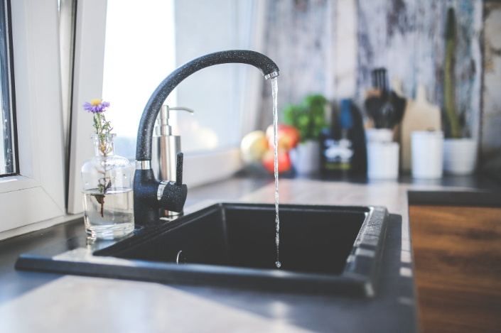 a faucet with dripping water